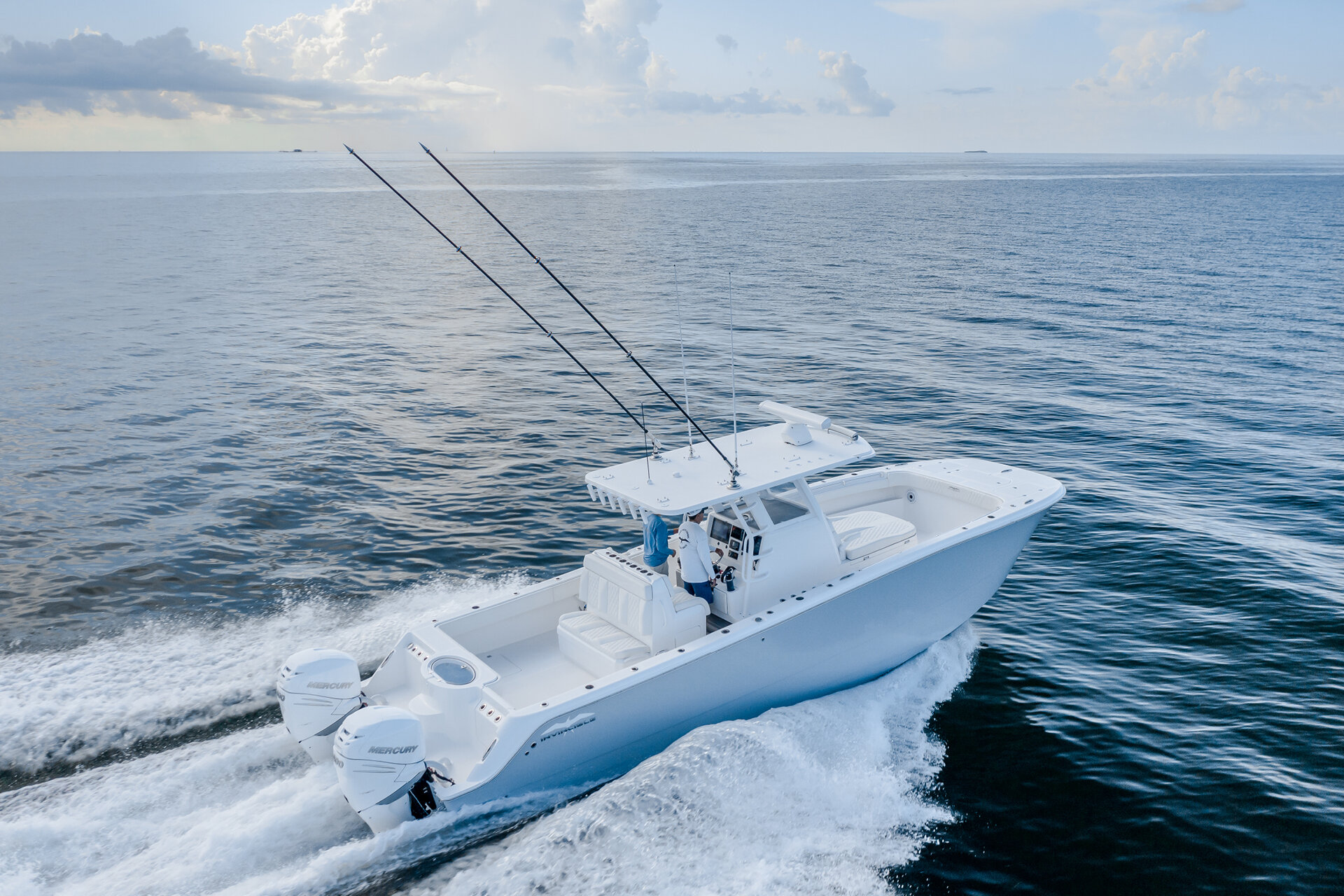 Invincible 33' Catamaran side view on the water