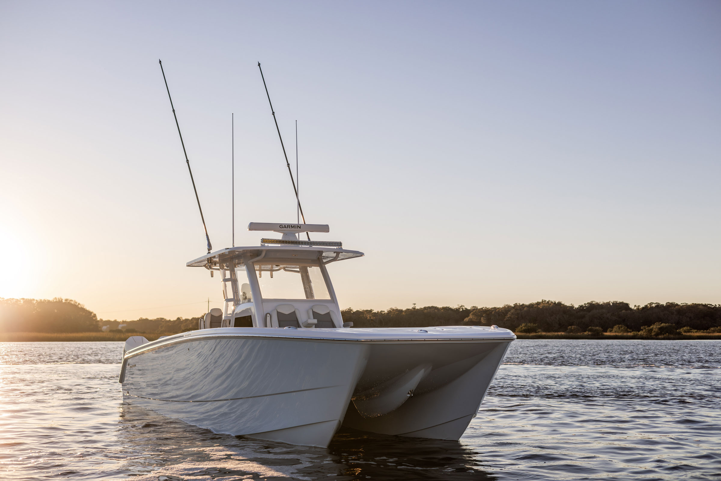 Invincible 38' Catamaran in the sunshine on the water