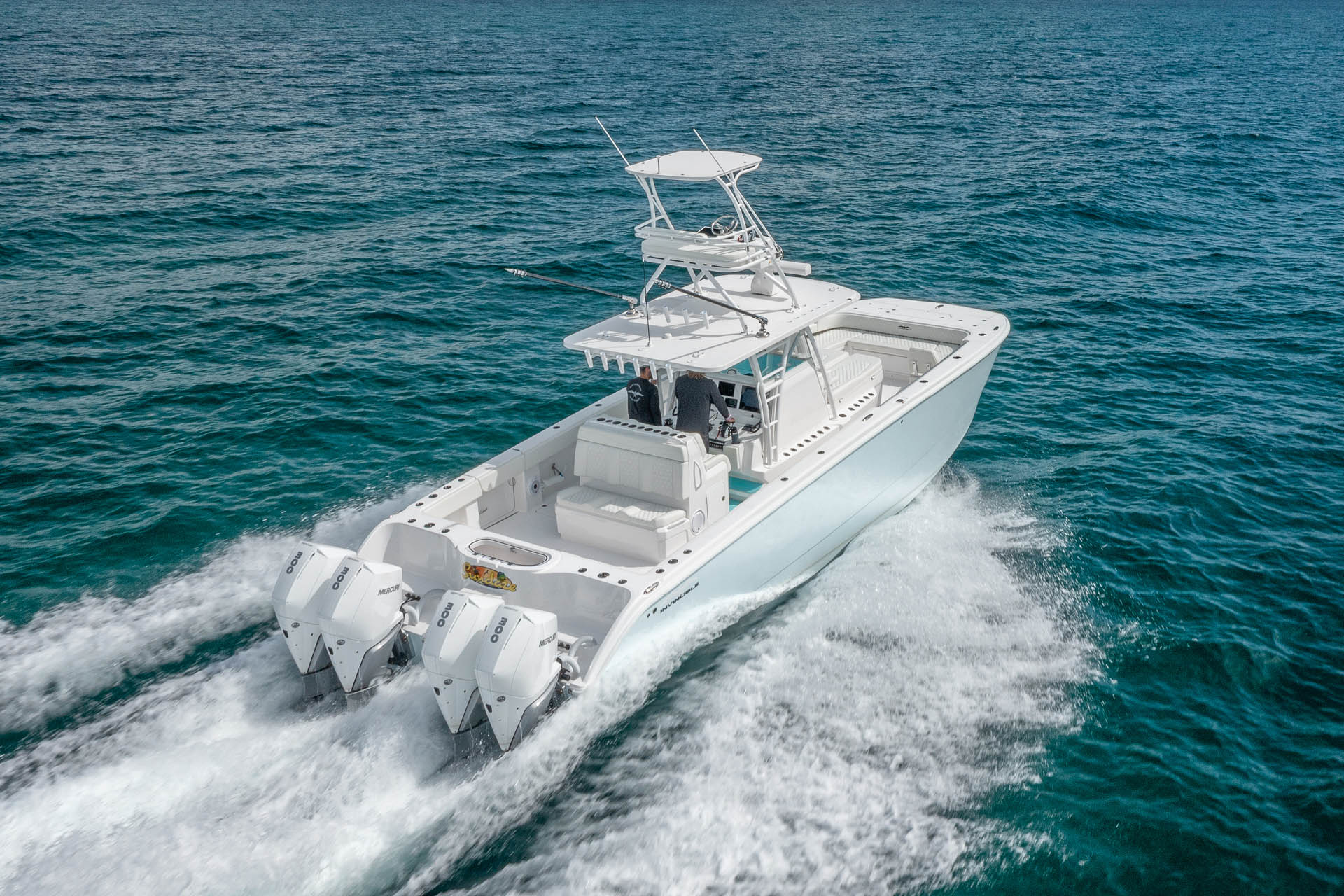 Invincible 38' Catamaran moving fast in the water